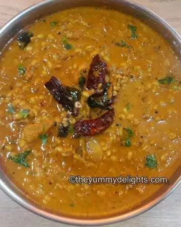 Close up of Mooga moley randayi in a serving dish.