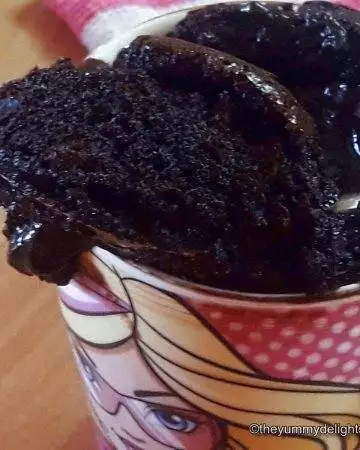 close up of chocolate mug cake made in microwave.