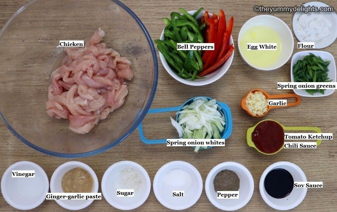 individually labeled ingredients to make dragon chicken are laid out on a table.