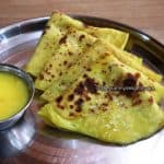 image close-up of Puran Poli served with ghee.