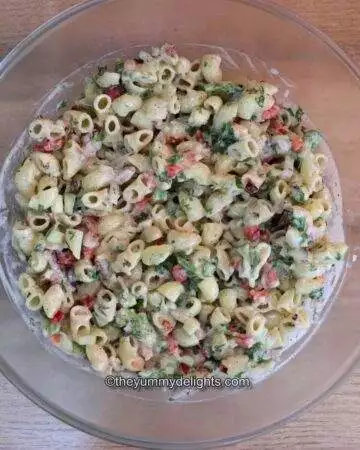 Creamy macaroni Salad in a glass bowl.