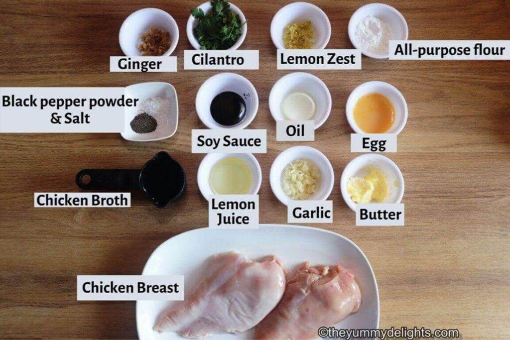 individually labeled ingredients to make lemon garlic chicken breast laid out on a table.