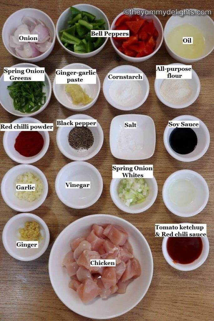 individually labeled ingredients to make chilli chicken dry is laid out on a table.