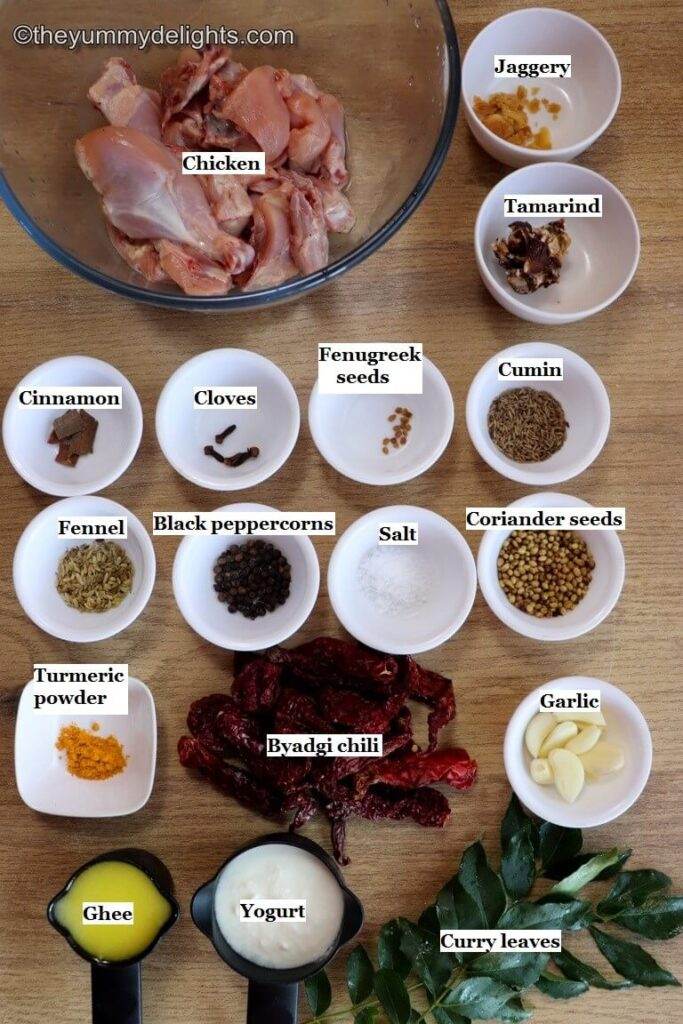 individually labeled ingredients to make mangalorean chicken ghee roast recipe is laid out on a table.