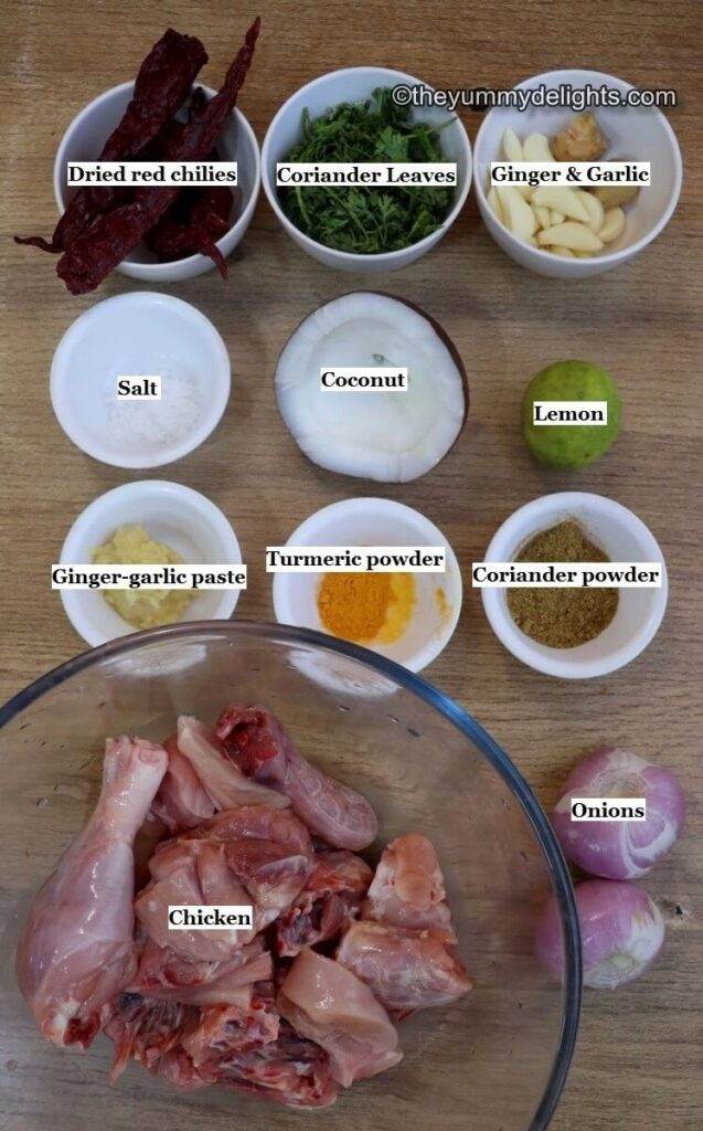 individually labeled ingredients to make Malvani chicken curry recipe are laid out on a table.
