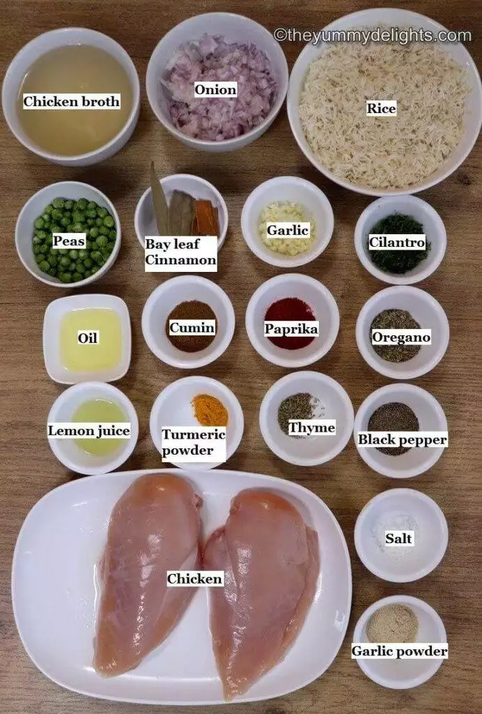 individually labeled ingredients to make mediterranean chicken and rice laid out on a table