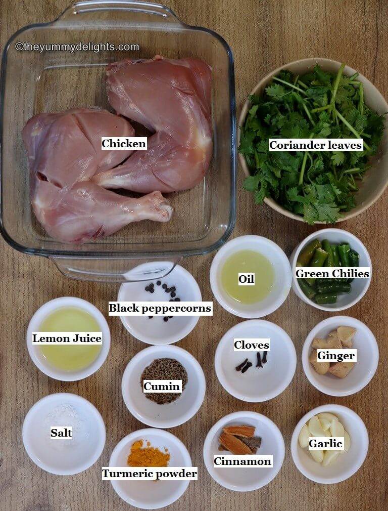 individually labeled ingredients to make chicken cafreal laid out on a table