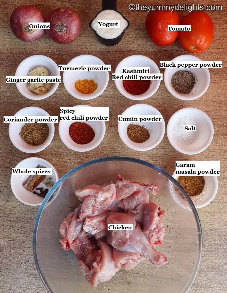 individually labeled ingredients to make chicken masala laid out on a table