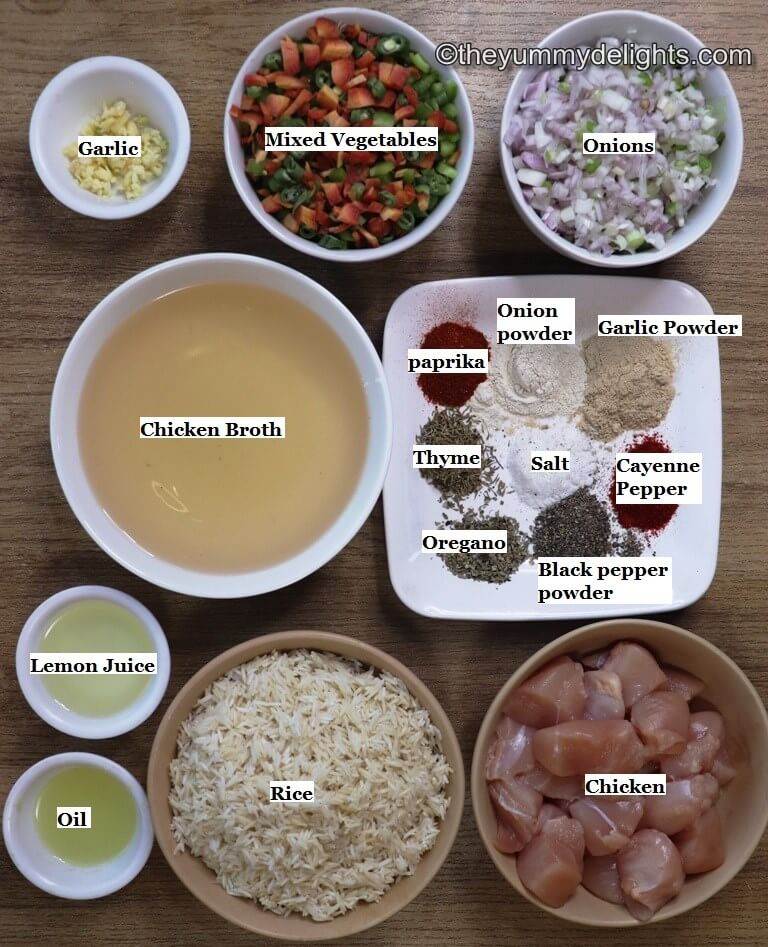individually labeled ingredients to make one pot chicken and rice are laid out on a table