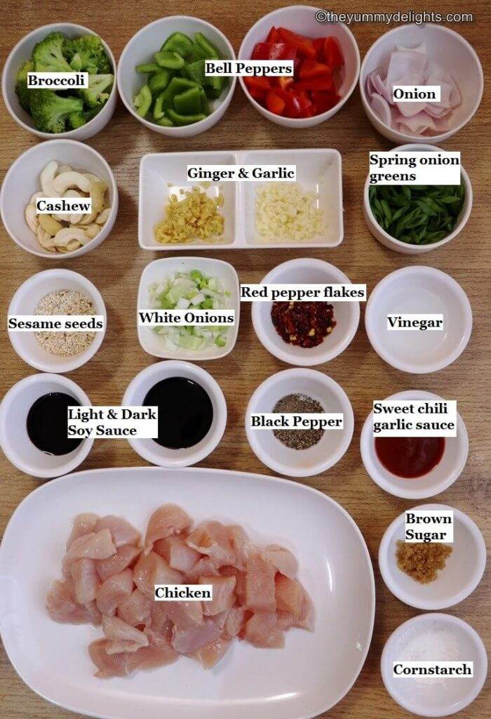 individually labeled ingredients to make chicken and vegetable stir fry recipe is laid out on a table.