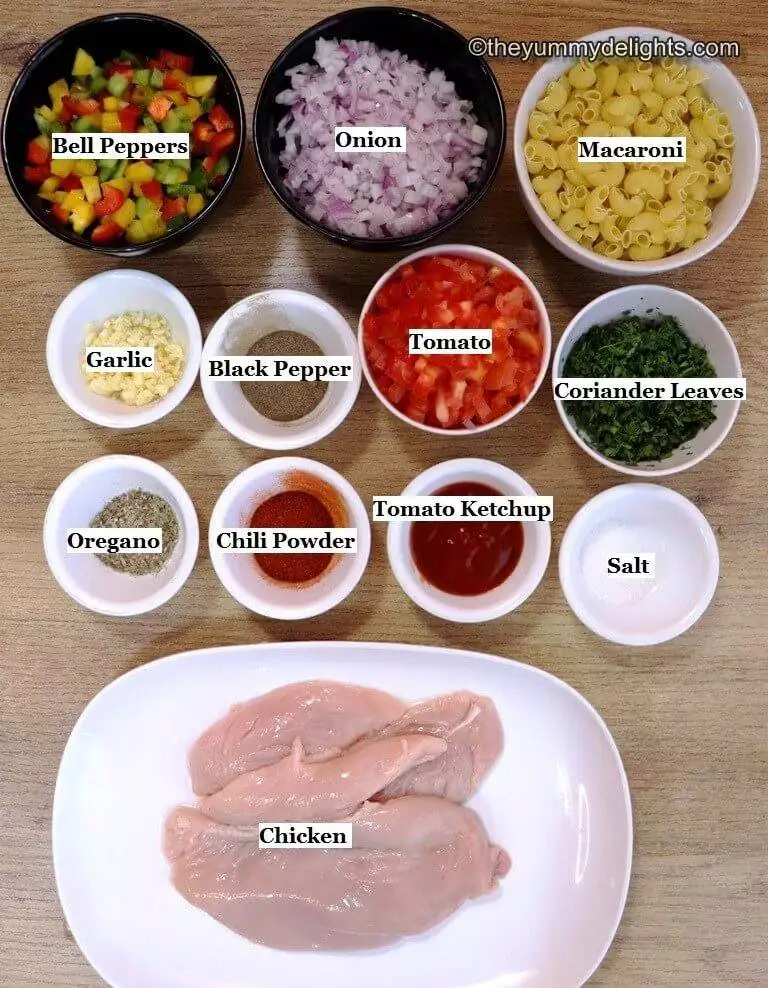 individually labeled ingredients to make chicken macaroni laid out on a table.