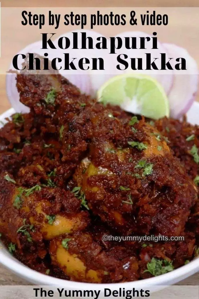 Close-up image of Kolhapuri chicken sukka served in a white bowl. It is served with a lemon wedge and onion slices.