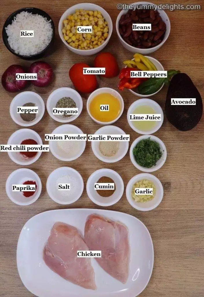 individually labeled ingredients to make chicken fajita rice bowl laid out on a table.