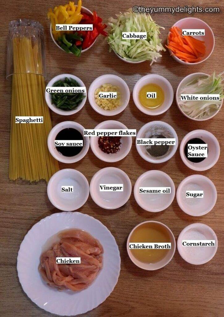 individually labeled ingredients to make chicken stir fry with noodles laid out on a table.