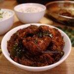 kerala chicken roast served in a white bowl.