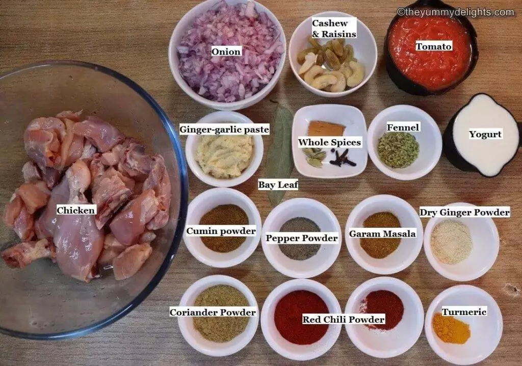 individually labeled ingredients to make Kashmiri chicken recipe is laid out on a table.