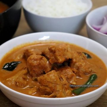 close-up of ceylon chicken curry in a white colored bowl.