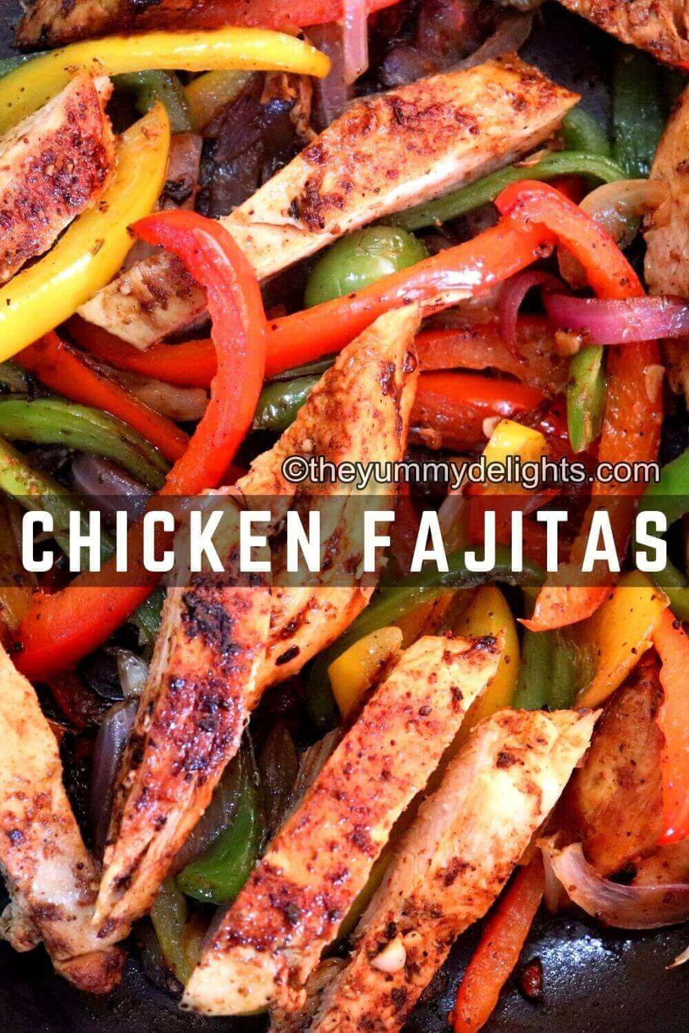 close-up of chicken fajitas in a skillet with text overlay.