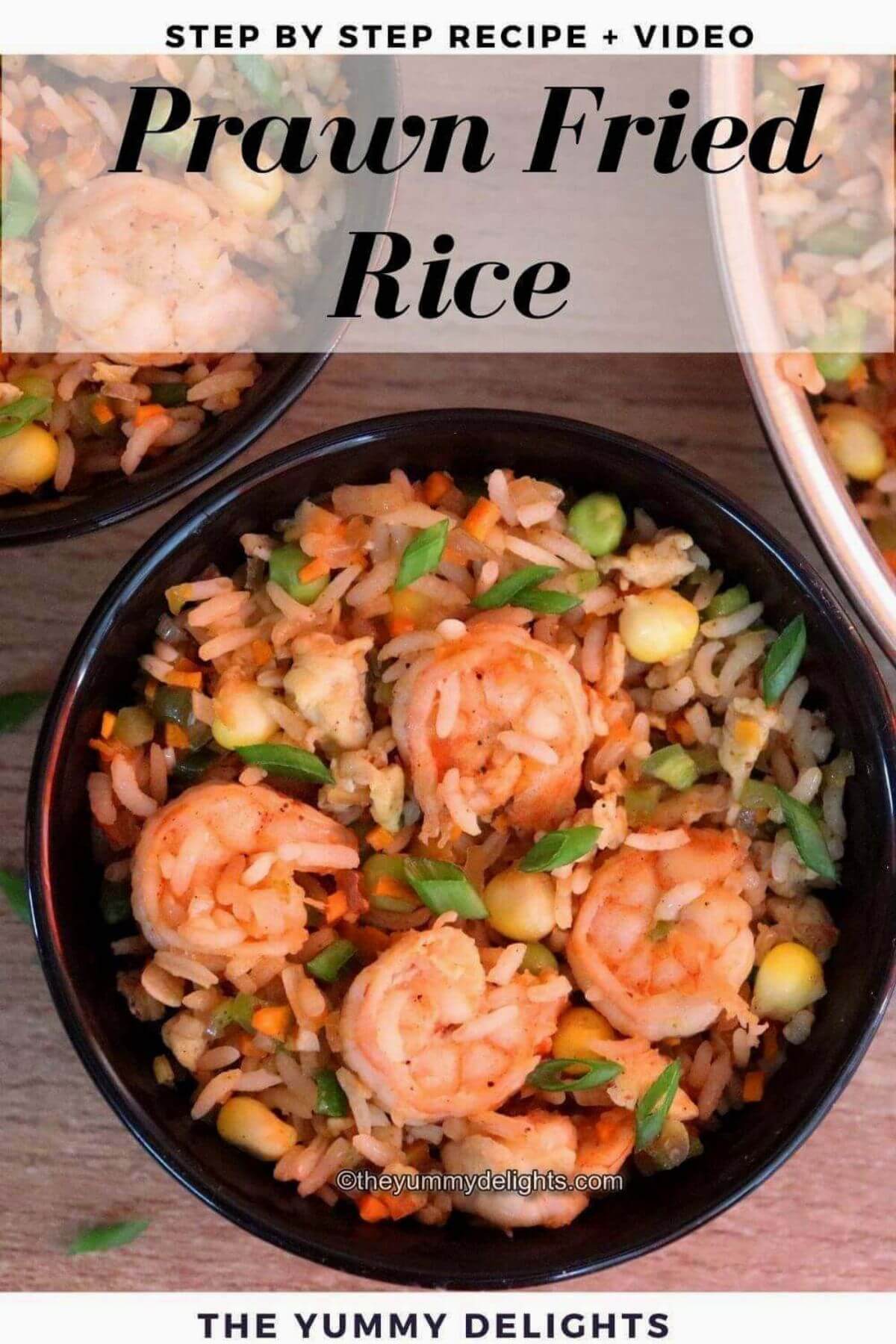top-view of prawn-fried rice in a black colored bowl with text overlay.