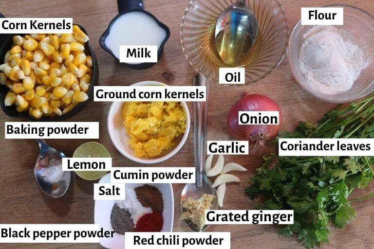 individually labeled ingredients to make crispy corn fritters are laid out on a table.