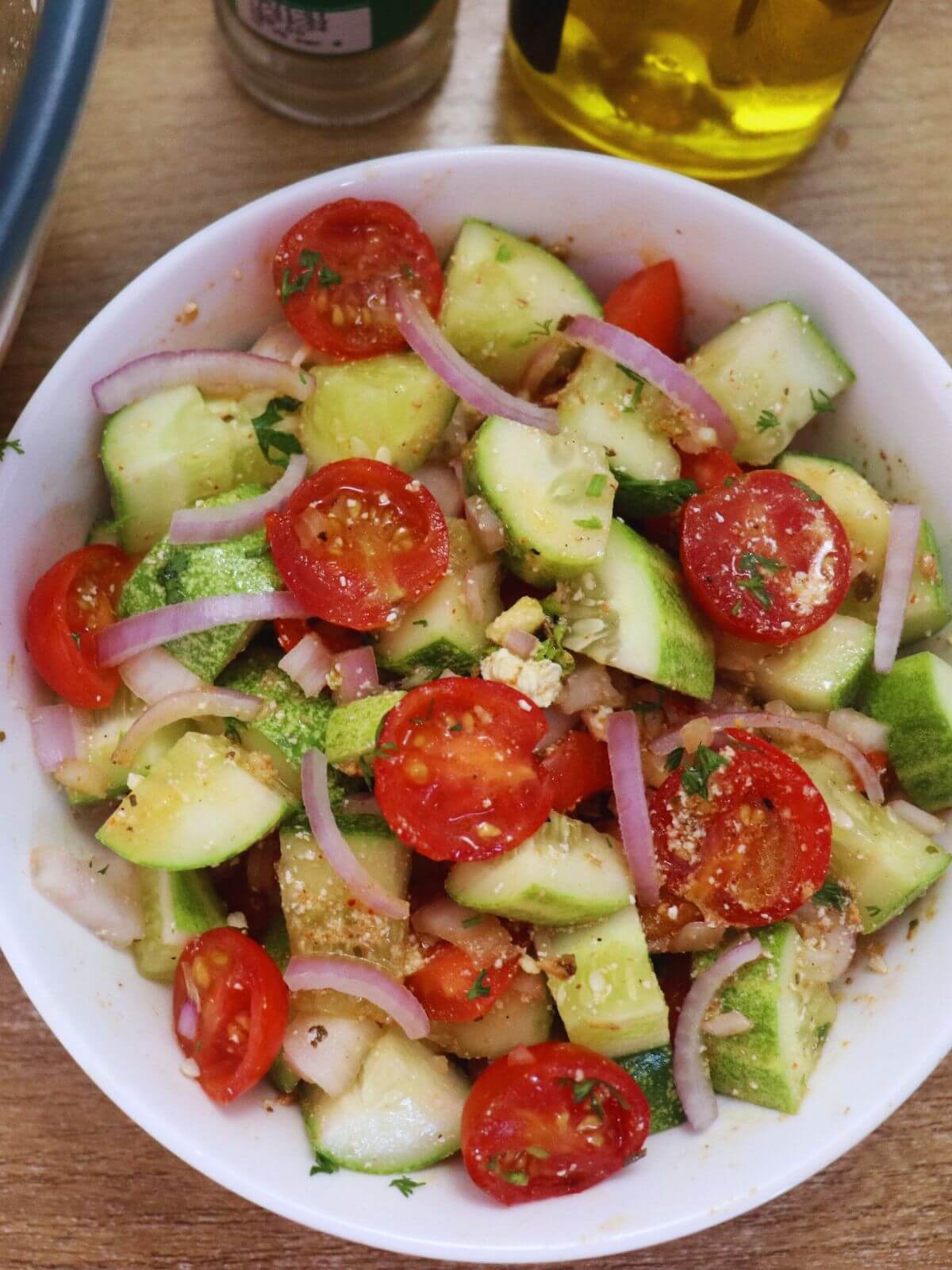 close-up of mediterranean cucumber tomato salad in a bowl.