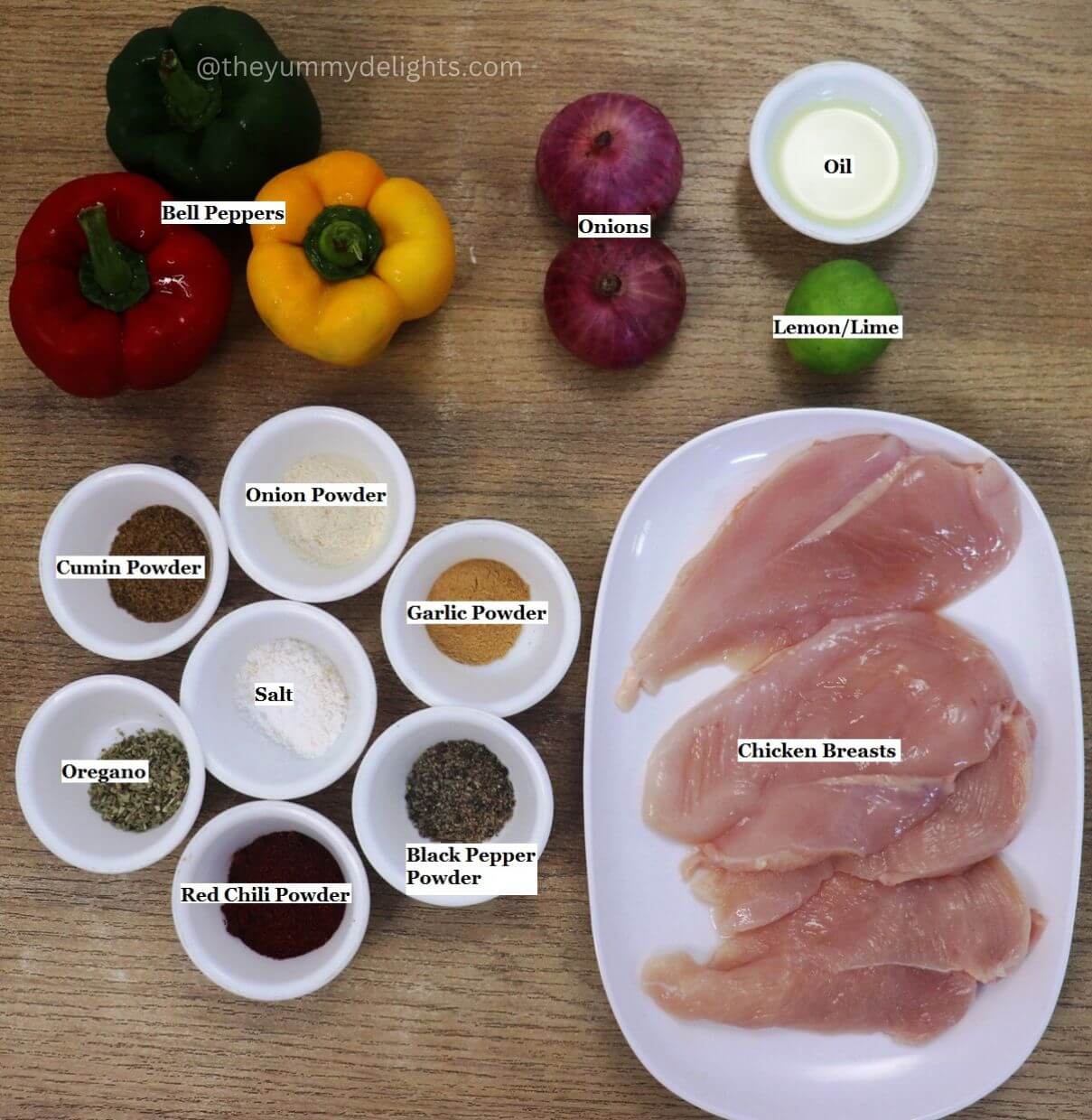 individually labeled ingredients to make chicken fajitas are laid out on a table.