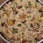 close-up of samak rice pulao in a pan.