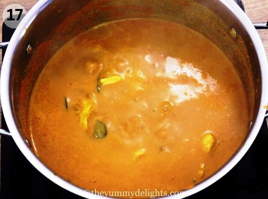 image of cooked mangalorean fish curry or meen ghassi in the pot.