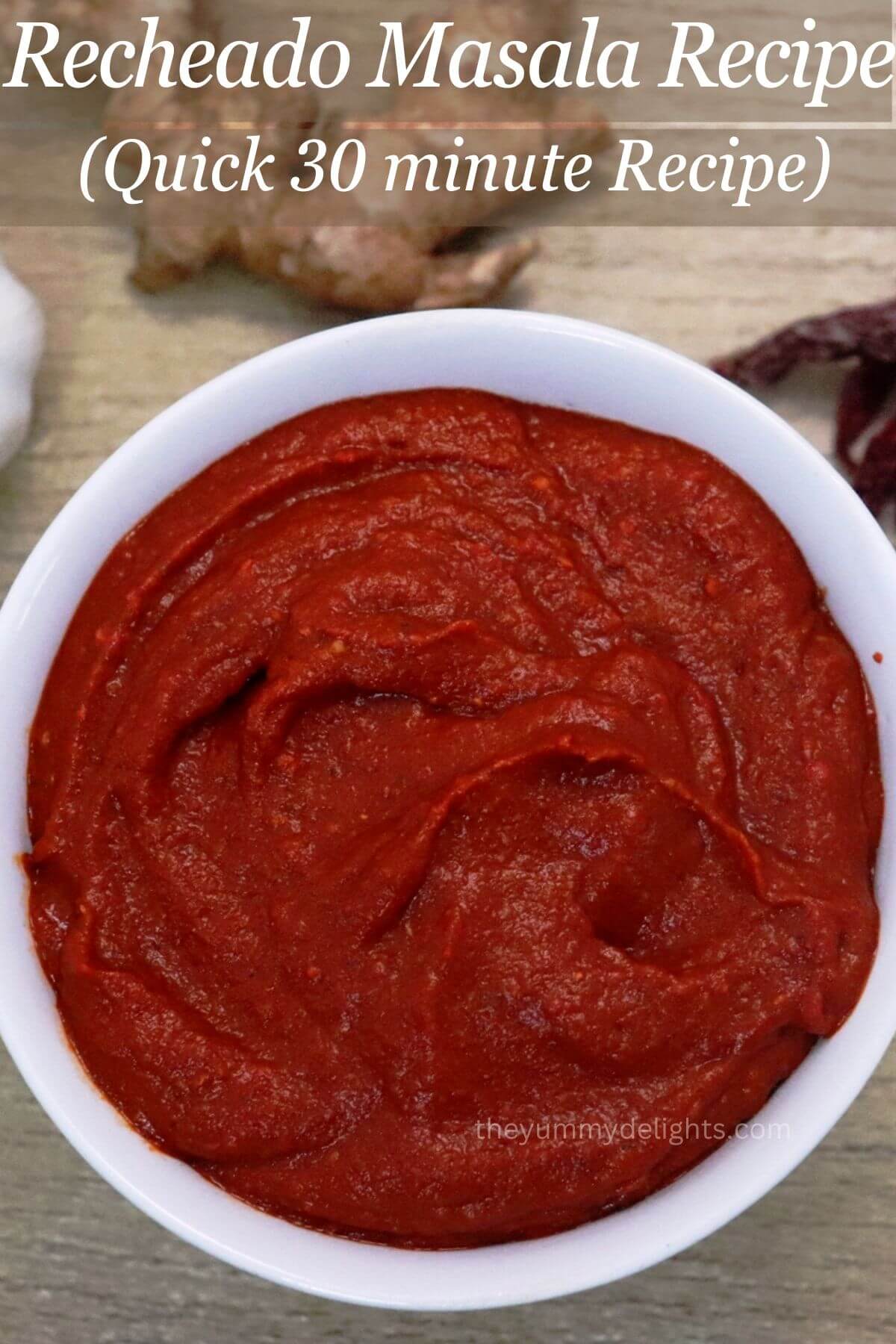 close-up of recheado masala in a white bowl.