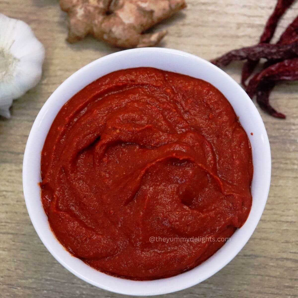 close-up of goan recheado masala in white bowl.