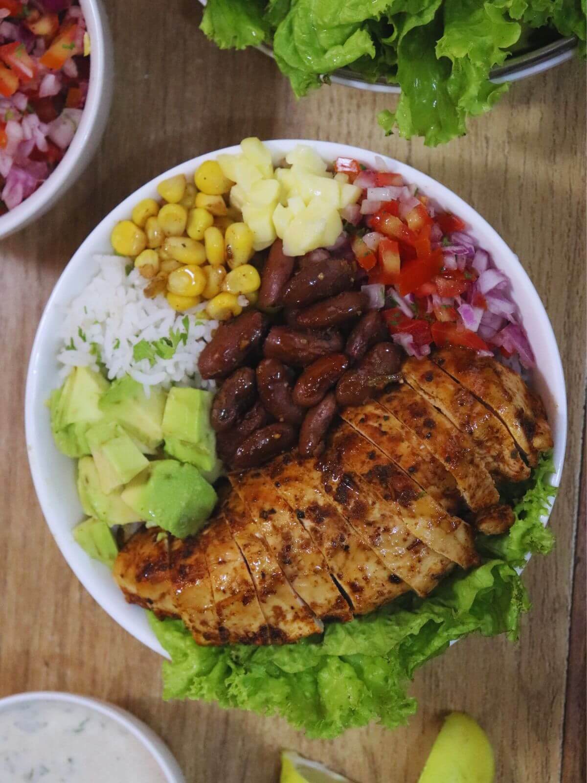 image of chicken fajita rice bowl in the center.