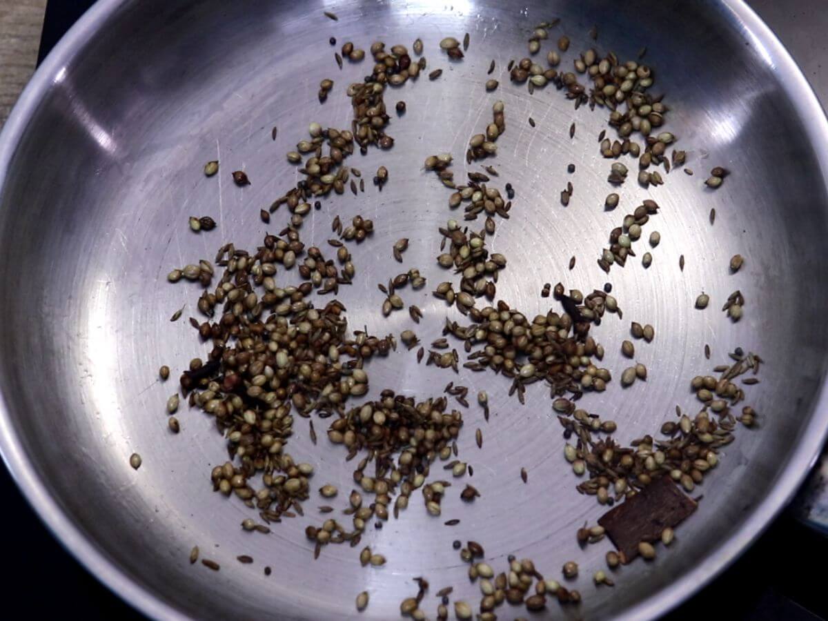roasting whole spices for the egg curry masala.