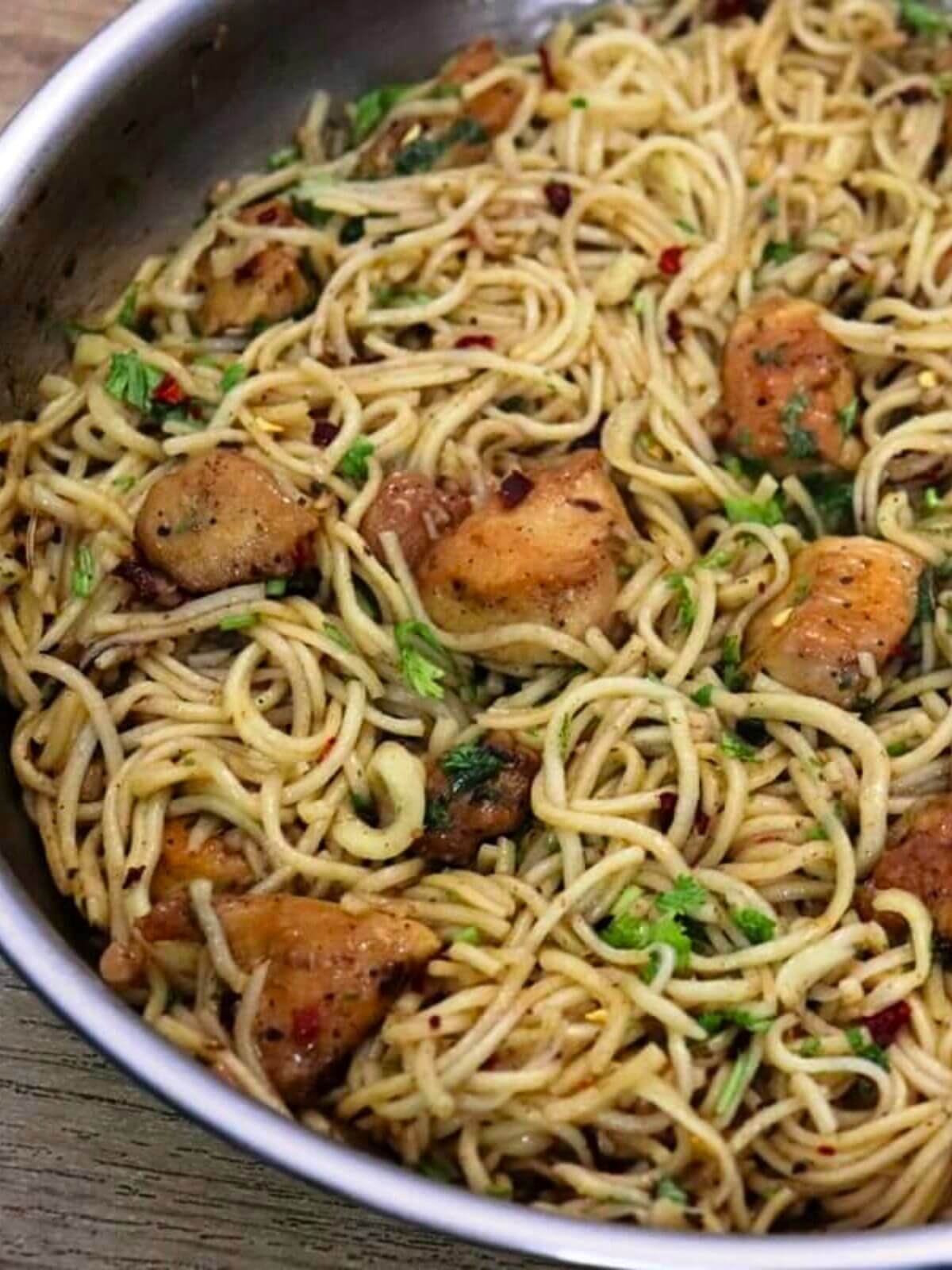 close-up of garlic butter chicken pasta noodles.