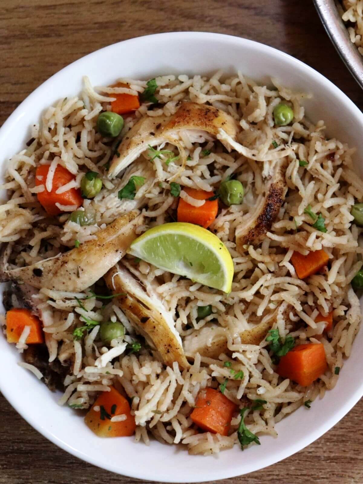 close-up of southern chicken and rice served in a bowl.