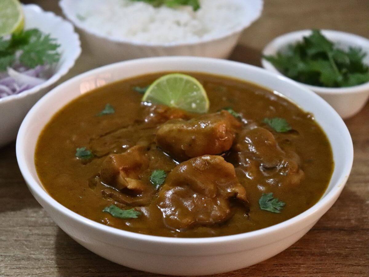 close-up of chicken dhansak served in a bowl.