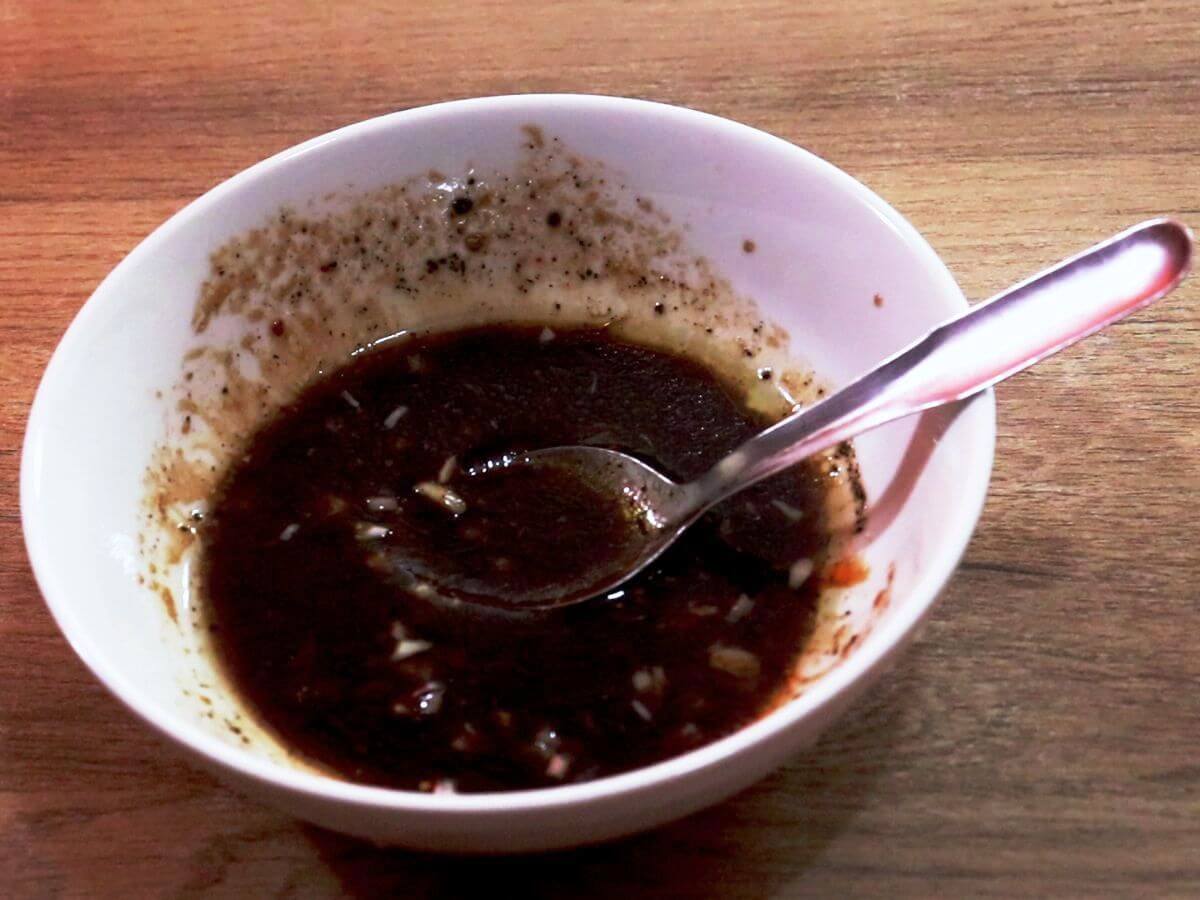 mixing the dressing ingredients in a small mixing bowl.