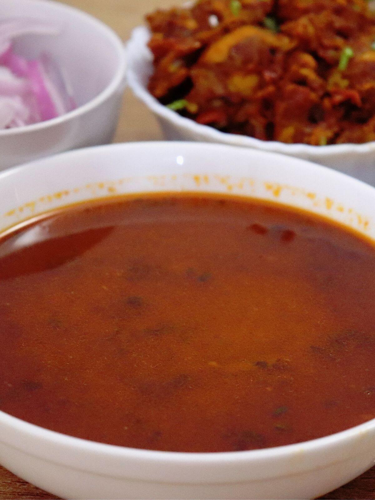 close-up of kolhapuri tambda rassa in a bowl.