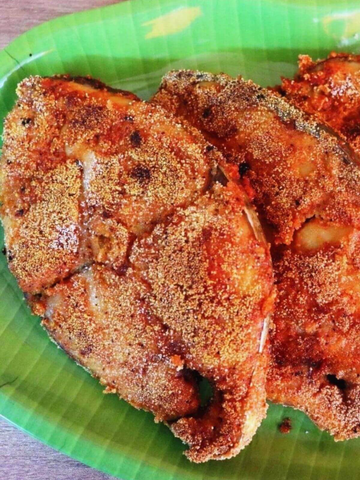close-up of mangalorean fish rava fry served on a plate.