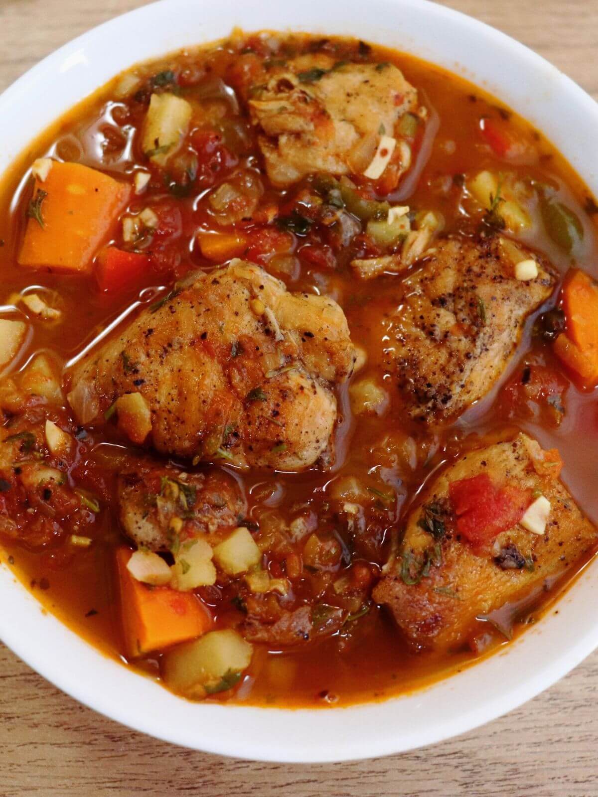 close-up of mediterranean chicken stew served in a bowl.