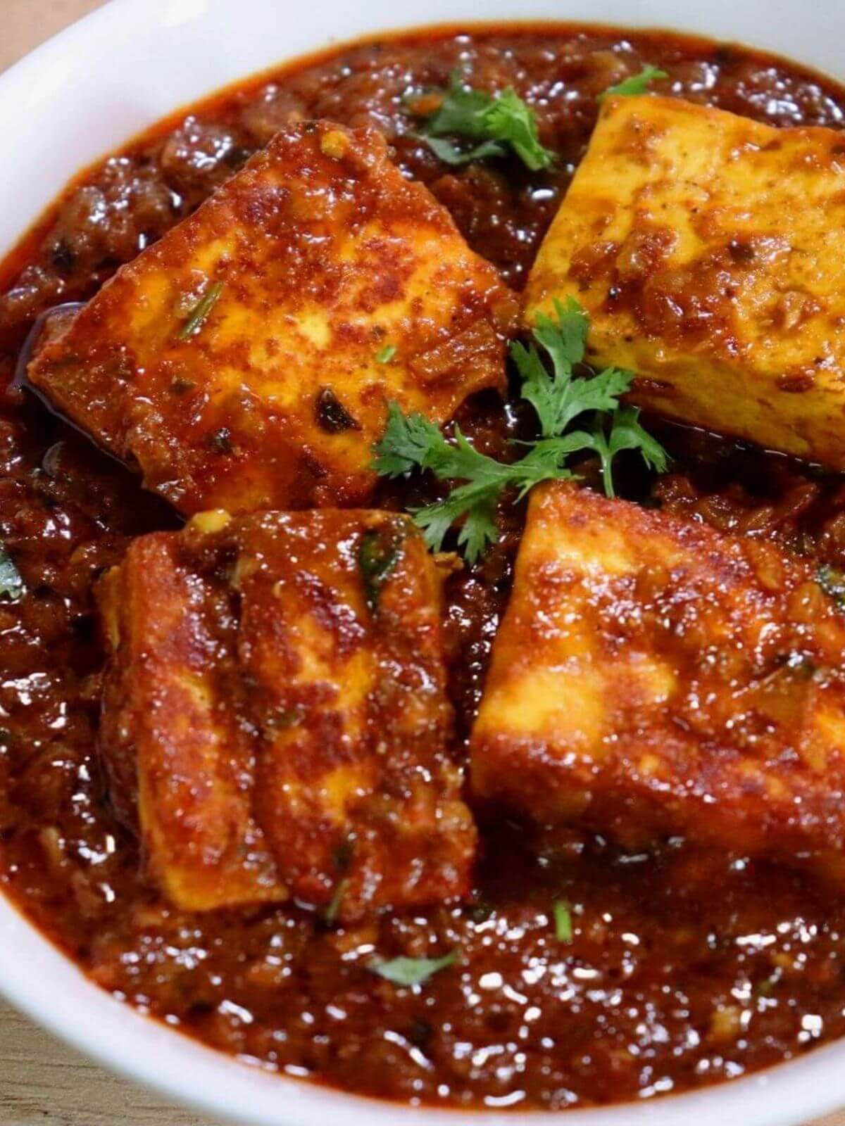 close-up of paneer masala in a bowl.