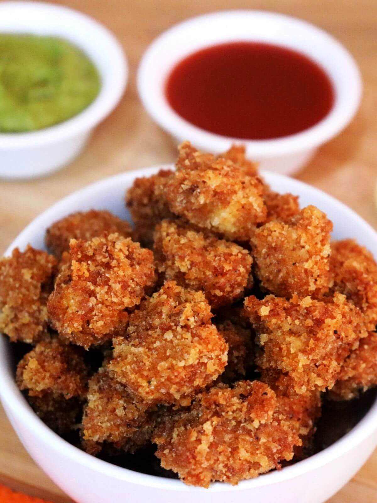 close-up of popcorn chicken served in a bowl.