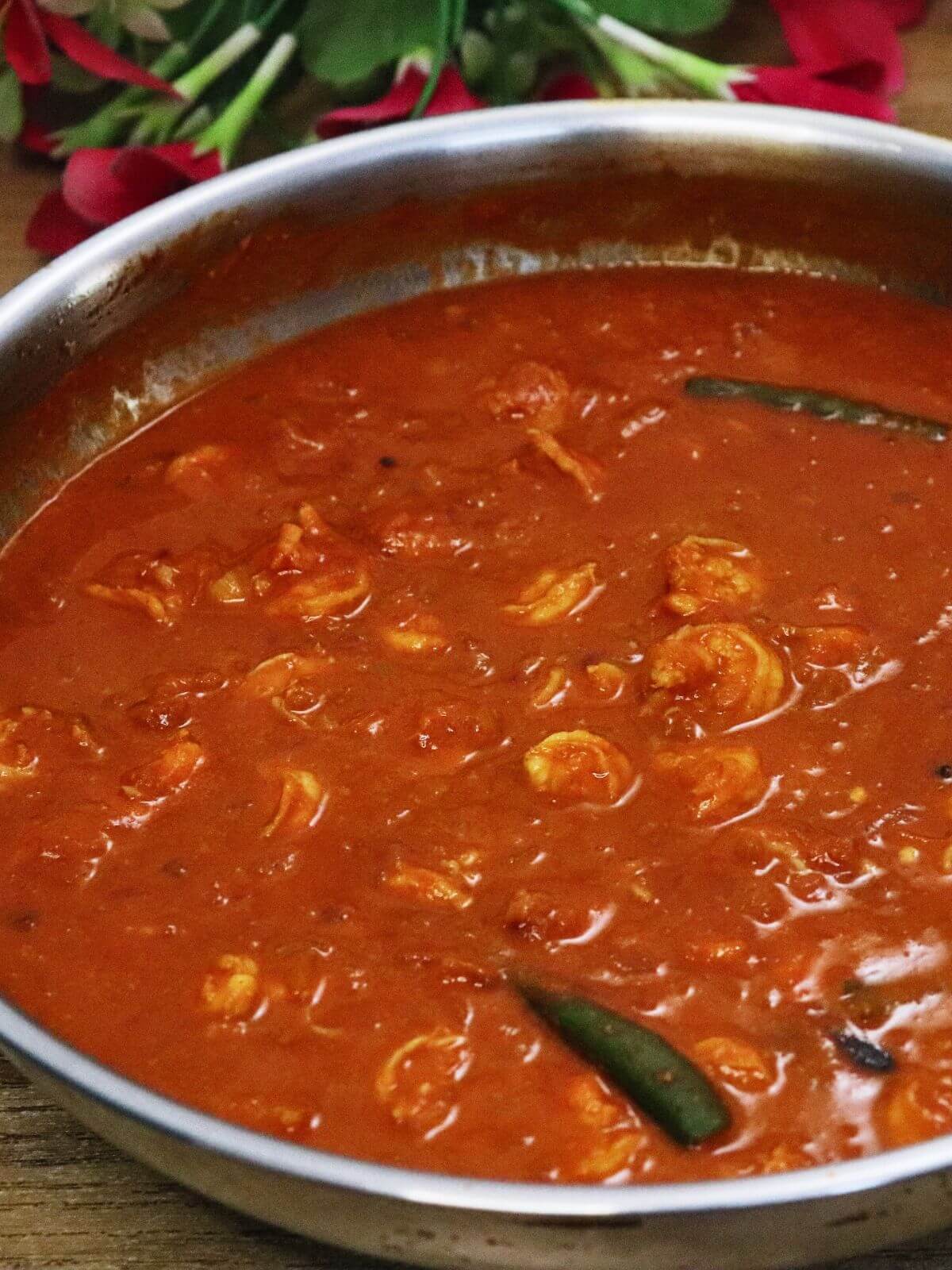 close-up of prawn ambotik in a skillet.