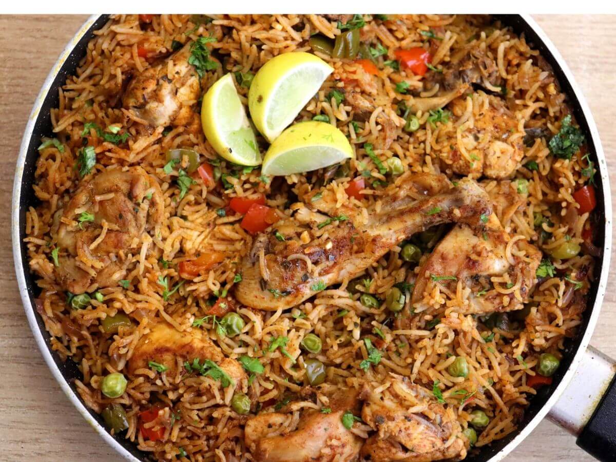 close-up of spanish chicken and rice in a pan.