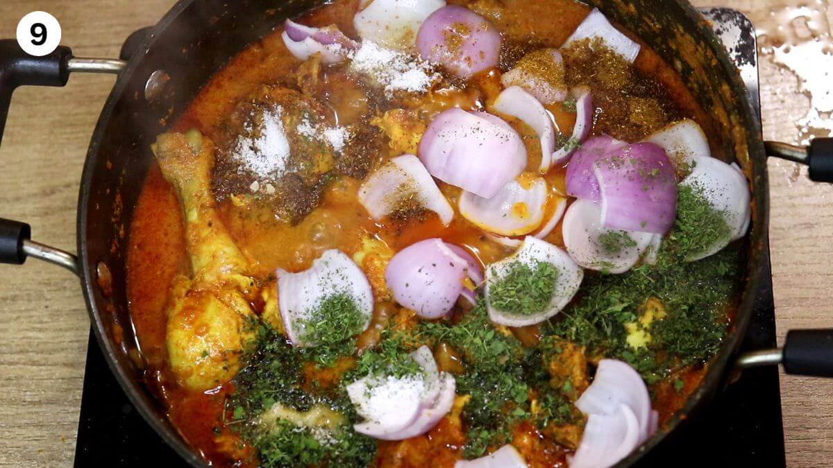 addition of onion petals, kasuri methi and garam masala to make murgh do pyaza.