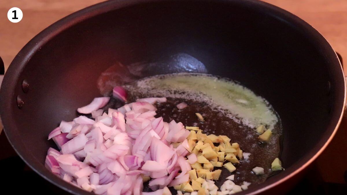 sautéing onion, garlic, and ginger in butter for roasted pumpkin soup base.