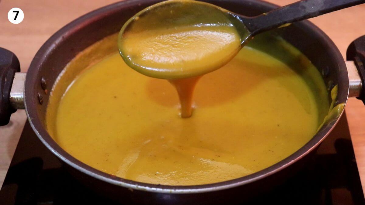 cooked roasted pumpkin soup in the pan.