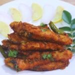 chicken majestic served on a white plate.