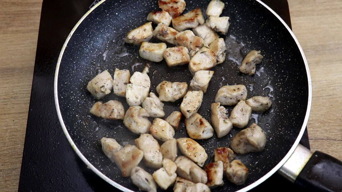 browning the chicken for creamy chicken stew recipe.
