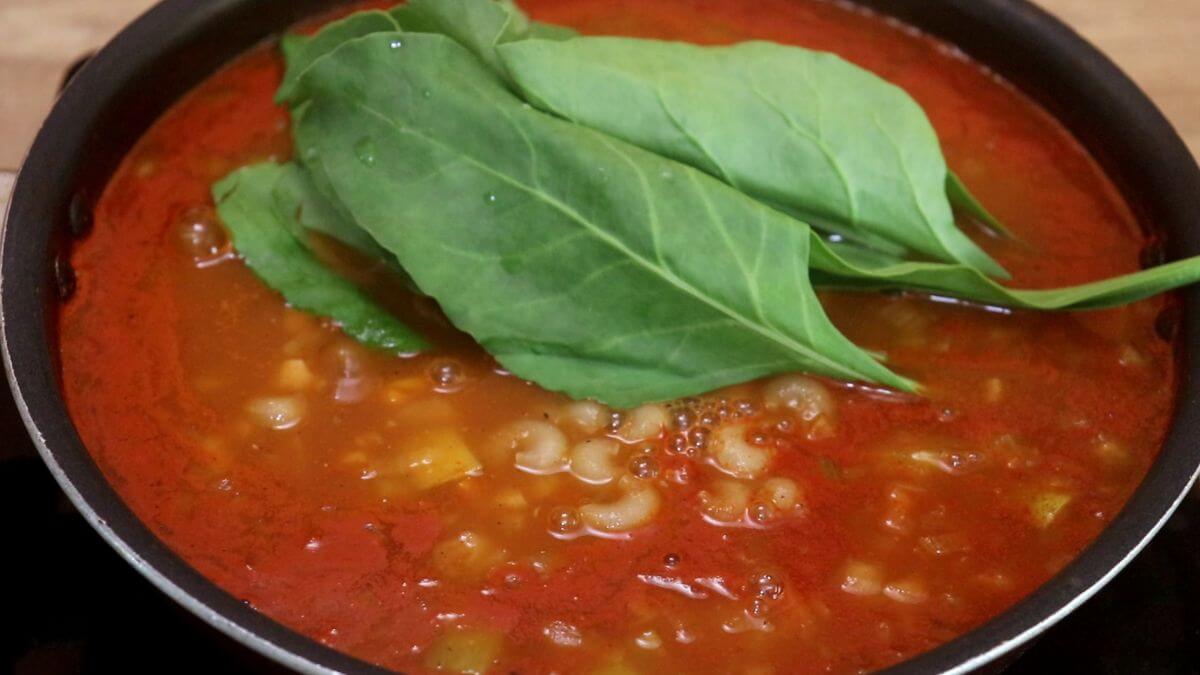 addition of pasta and spinach leaves to make minestrone.