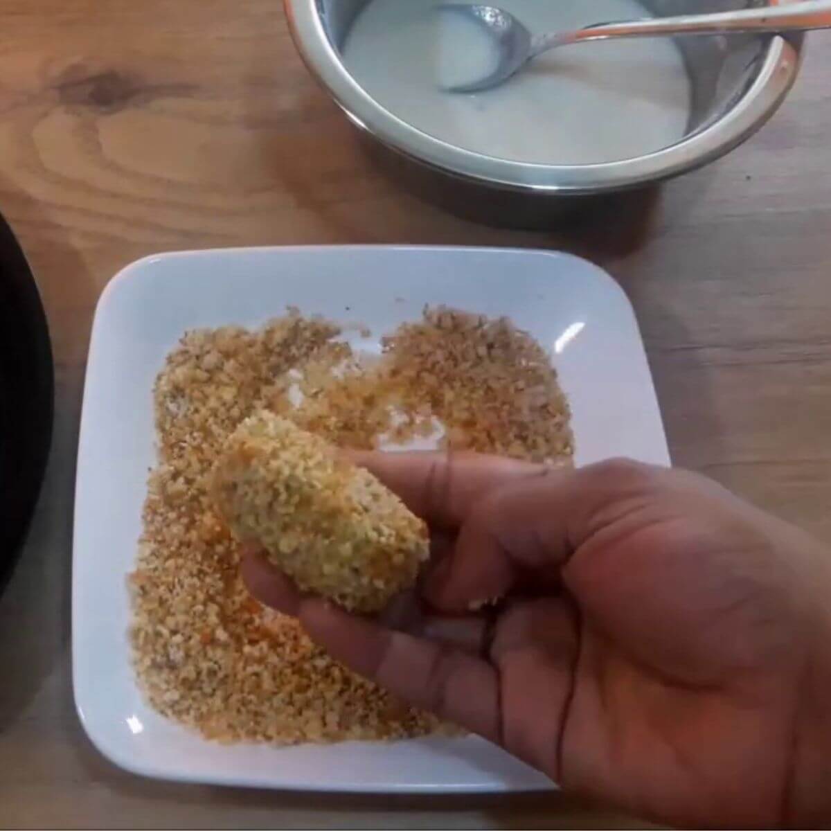 potato nuggets coated with bread crumbs.